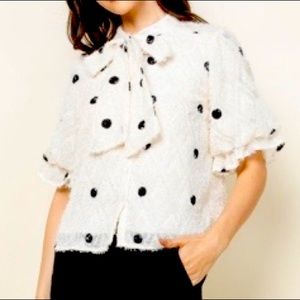White and with black polka dot mohair top